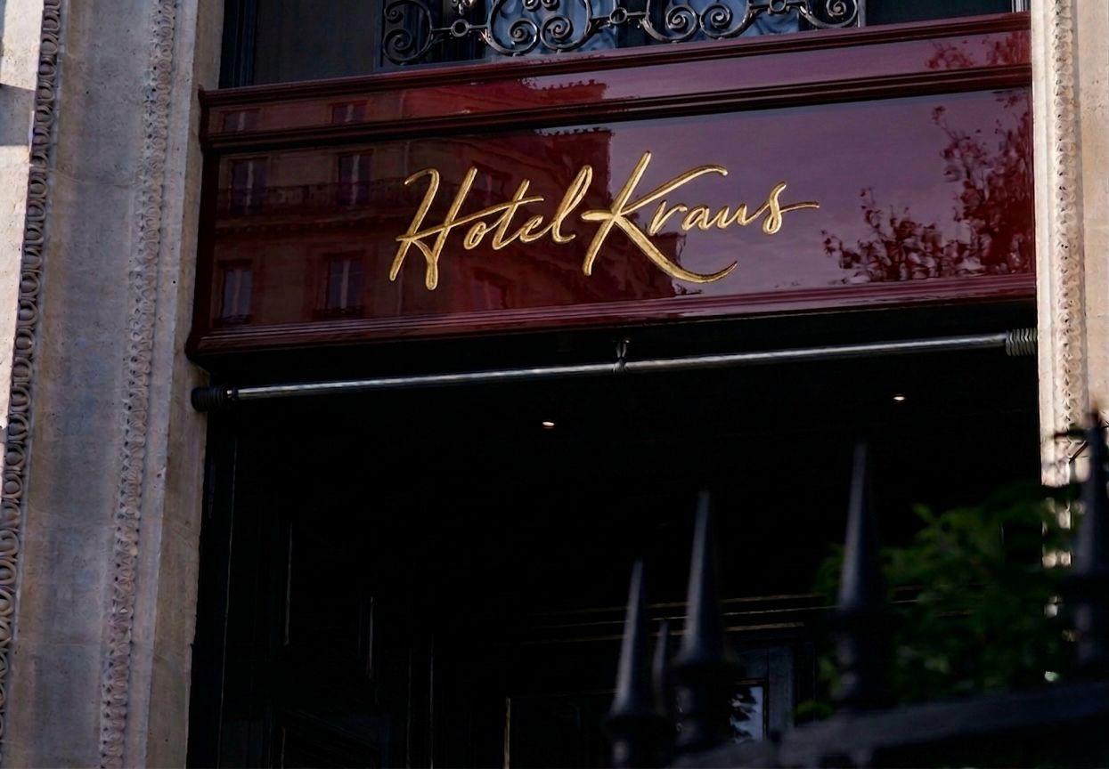 The signature, over the door