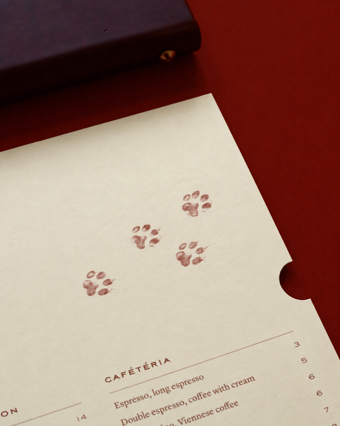 The tea menu, with paw prints